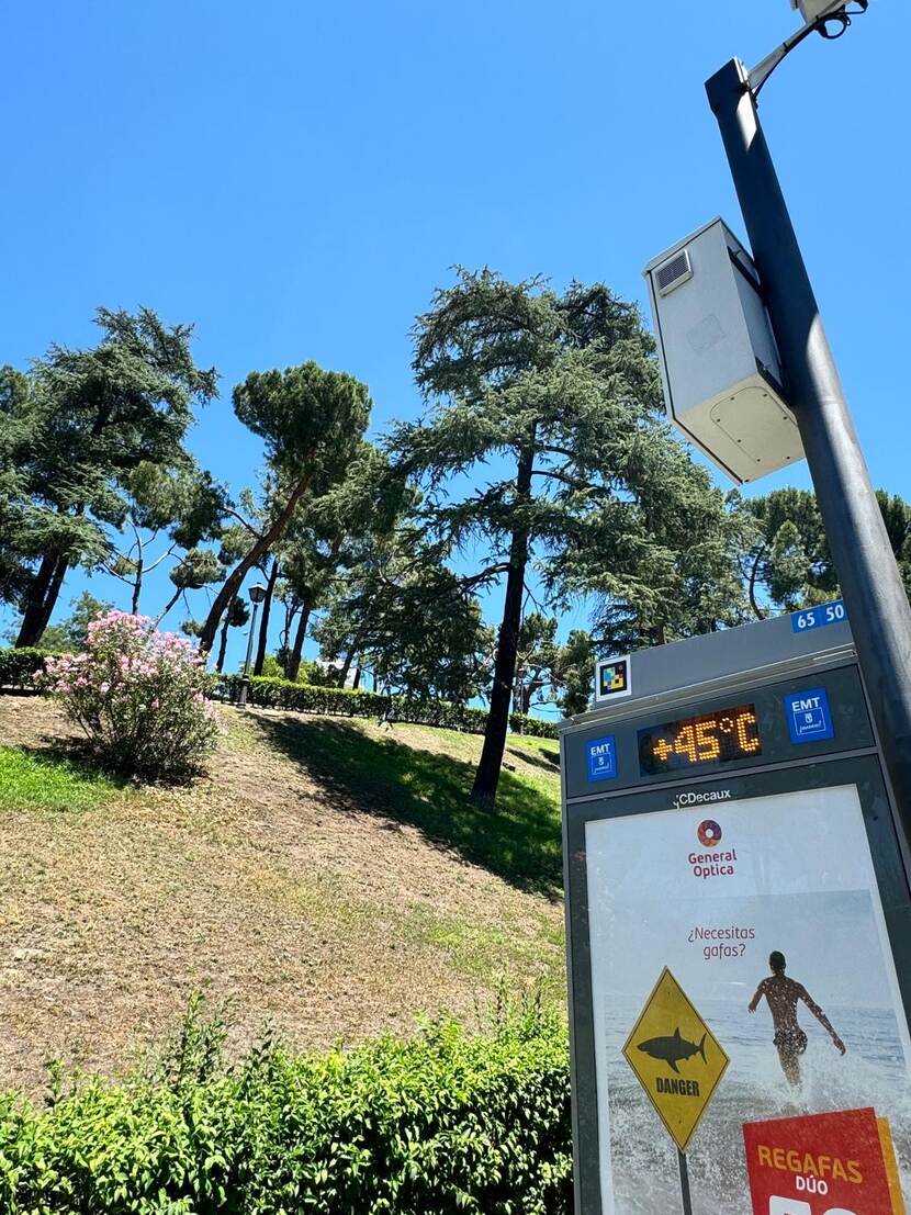 bus stop with heat warning in summer in spain